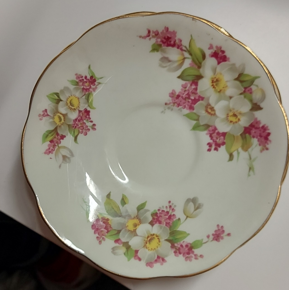 4 Vintage Royal crown pottery saucers